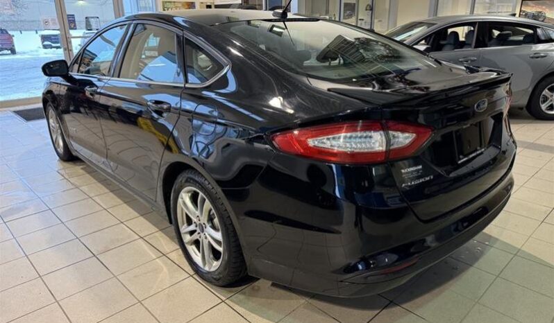 
								2016 Ford Fusion HEV SE full									