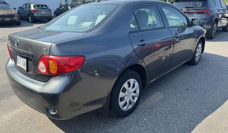 
								2010 Toyota Corolla 4-Door Sedan Ce 4a full									